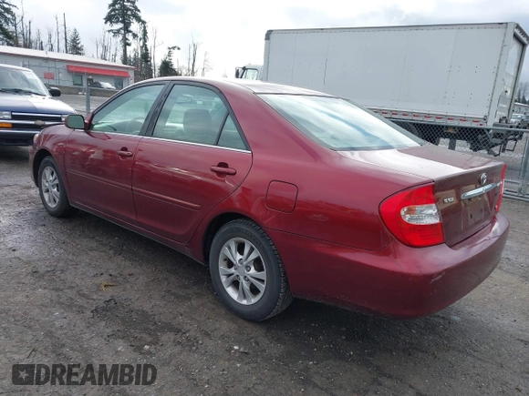 2004 Toyota Camry LE with VIN 4T1BF32K74U069737, listed as a IAAI auction lot 41746236 with 48,026 mi miles. Bid and sale history available at carsss.com. Image 3.