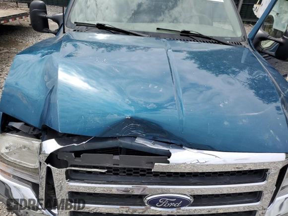 2001 Ford F-350 XL z VIN 1FTSW30F61EA47096, wystawiony jako Copart lot #56826595 z przebiegiem 205 679 mil mil oraz Szkoda całkowita • Salvage title. Historia ofert i sprzedaży dostępna na DreamBid. Obrazek 11.