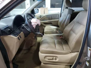 2009 Honda Odyssey EX-L with VIN 5FNRL38759B402158, listed as a Copart auction lot 52025715 with 239,340 mi miles and Salvage Title. Bid and sale history available at carsss.com. Image 7.