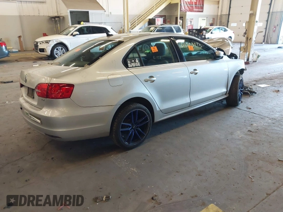 2013 Volkswagen Jetta TDI w/Premium with VIN 3VWLL7AJ5DM402469, listed as a IAAI auction lot 41703173 with Not provided miles and . Bid and sale history available at DreamBid. Image 4.