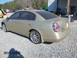 2002 Nissan Altima S with VIN 1N4AL11D92C287784, listed as a IAAI auction lot 41671404 with 131,942 mi miles. Bid and sale history available at carsss.com. Image 3.