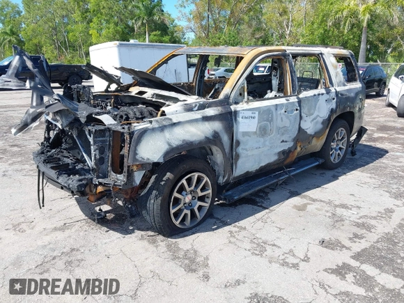 2015 GMC Yukon Denali with VIN 1GKS2CKJXFR655818, listed as a IAAI auction lot 41641960 with 1 mi miles. Bid and sale history available at carsss.com. Image 2.