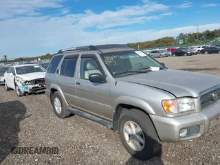 2002 Nissan Pathfinder SE z VIN JN8DR09Y42W735181, wystawiony jako IAAI lot #40586238 z przebiegiem 141 884 mil mil oraz . Historia ofert i sprzedaży dostępna na DreamBid. Obrazek 1.