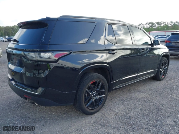 2018 Chevrolet Traverse Premier with VIN 1GNEVJKW2JJ247358, listed as a IAAI auction lot 41957576 with 84,689 mi miles. Bid and sale history available at carsss.com. Image 4.