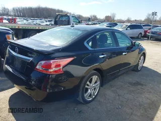 2013 Nissan Altima SV with VIN 1N4BL3AP7DN470960, listed as a IAAI auction lot 41968524 with 118,263 mi miles and . Bid and sale history available at DreamBid. Image 4.