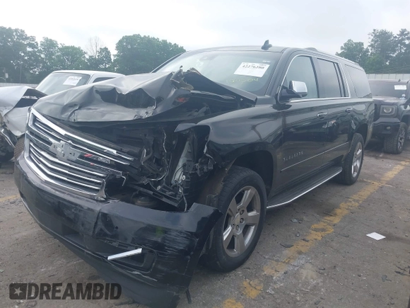 2018 Chevrolet Suburban Premier with VIN 1GNSCJKC9JR100504, listed as a IAAI auction lot 42276280 with 153,916 mi miles and . Bid and sale history available at DreamBid. Image 2.