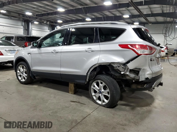 2016 Ford Escape Titanium with VIN 1FMCU9J95GUC27654, listed as a Copart auction lot 51950575 with 101,220 mi miles and Salvage Title. Bid and sale history available at carsss.com. Image 2.