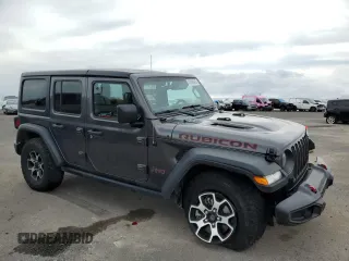 2022 Jeep Wrangler Unlimited Rubicon with VIN 1C4HJXFN9NW256461, listed as a Copart auction lot 43188065 with 26,944 mi miles and Salvage title. Bid and sale history available at DreamBid. Image 4.