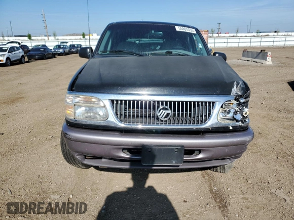 1997 Mercury Mountaineer with VIN 4M2DU55P5VUJ62435, listed as a Copart auction lot 60163465 with 105,646 mi miles and Salvage title. Bid and sale history available at DreamBid. Image 5.