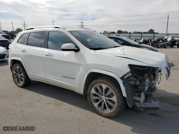 2019 Jeep Cherokee Overland with VIN 1C4PJMJX2KD351485, listed as a Copart auction lot 71641954 with 95,266 mi miles and Salvage Title. Bid and sale history available at carsss.com. Image 4.