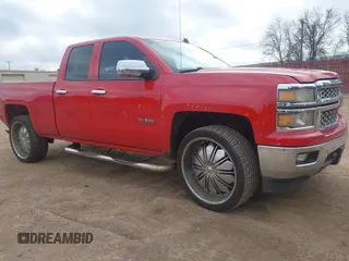 2014 Chevrolet Silverado 1500 LT with VIN 1GCRCREC1EZ218831, listed as a IAAI auction lot 41474457 with 193,309 mi miles and . Bid and sale history available at DreamBid. Image 1.