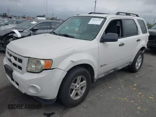 2009 Ford Escape Hybrid with VIN 1FMCU49379KA89407, listed as a IAAI auction lot 41692553 with 172,637 mi miles. Bid and sale history available at carsss.com. Image 2.