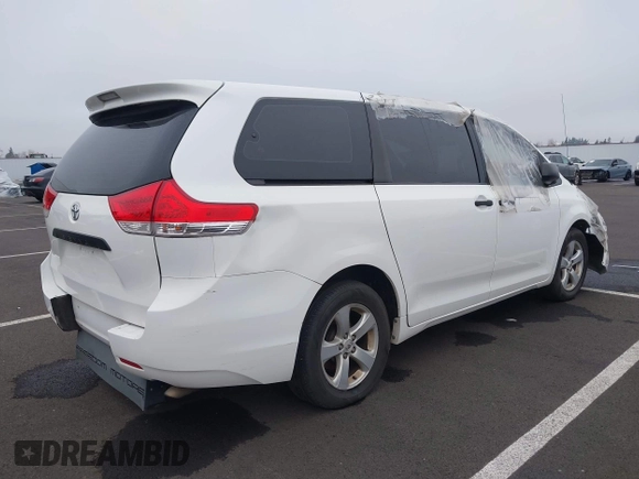 2012 Toyota Sienna with VIN 5TDZK3DCXCS271365, listed as a IAAI auction lot 38121628 with 101,756 mi miles and . Bid and sale history available at DreamBid. Image 4.