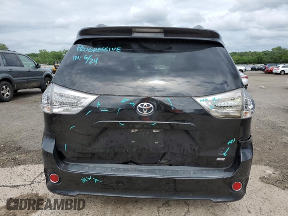 2014 Toyota Sienna SE with VIN 5TDXK3DC7ES425945, listed as a Copart auction lot 63067955 with 173,815 mi miles and Salvage title. Bid and sale history available at DreamBid. Image 6.