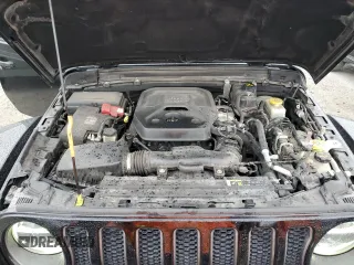 2019 Jeep Wrangler Unlimited Rubicon with VIN 1C4HJXFN6KW665805, listed as a Copart auction lot 45424005 with 141,007 mi miles and Salvage title. Bid and sale history available at DreamBid. Image 12.