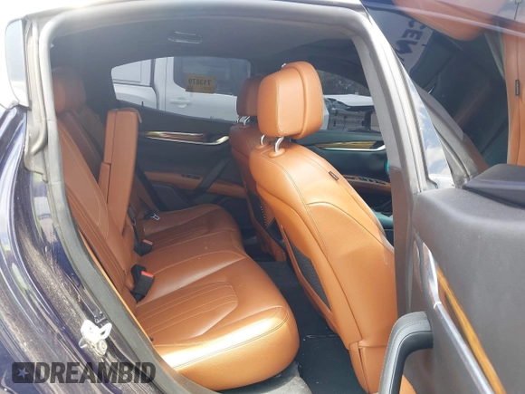 2016 Maserati Ghibli S Q4 z VIN ZAM57RTA4G1178696, wystawiony jako IAAI lot #42294337 z przebiegiem 69 752 mil mil oraz . Historia ofert i sprzedaży dostępna na DreamBid. Obrazek 8.