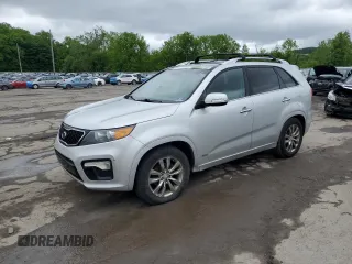 2012 Kia Sorento SX z VIN 5XYKWDA29CG267330, wystawiony jako Copart lot #58859445 z przebiegiem 208 264 mil mil oraz Czysty tytuł • Clean title. Historia ofert i sprzedaży dostępna na DreamBid. Obrazek 1.