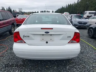 2004 Ford Focus ZTS with VIN 1FAFP38Z34W137002, listed as a IAAI auction lot 41867443 with 185,862 mi miles and . Bid and sale history available at carsss.com. Image 16.