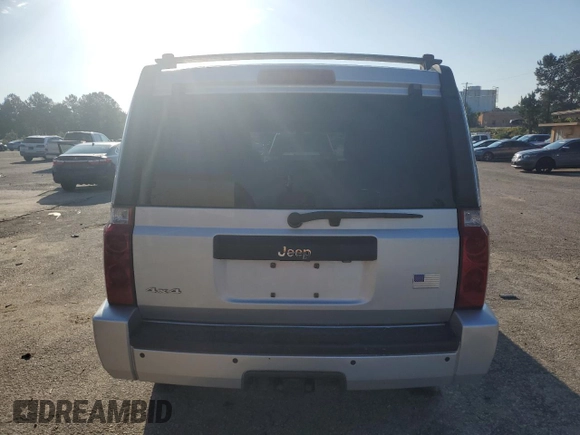 2010 Jeep Commander Sport with VIN 1J4RG4GK4AC125711, listed as a Copart auction lot 60369545 with 209,522 mi miles and Clean title. Bid and sale history available at DreamBid. Image 6.