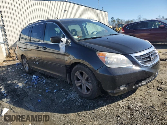 2010 Honda Odyssey Touring with VIN 5FNRL3H91AB030422, listed as a Copart auction lot 88737745 with 0 mi miles and Salvage Title. Bid and sale history available at carsss.com. Image 4.