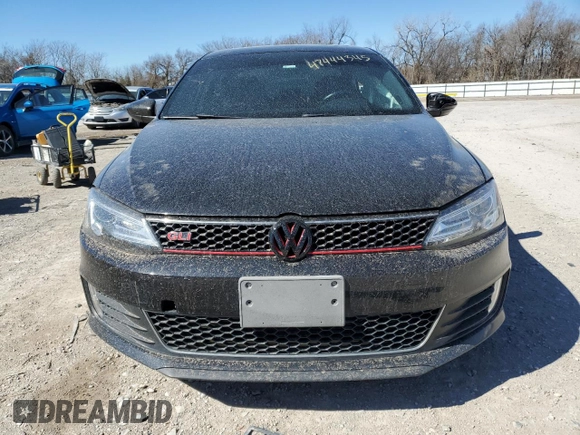 2014 Volkswagen Jetta GLI Edition 30 z VIN 3VW4S7AJ4EM325666, wystawiony jako Copart lot #47444345 z przebiegiem 182 665 mil mil oraz Szkoda całkowita • Salvage title. Historia ofert i sprzedaży dostępna na DreamBid. Obrazek 5.