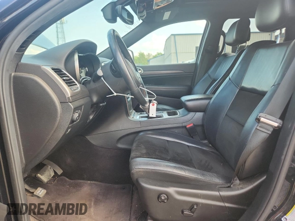 2018 Jeep Grand Cherokee Laredo E z VIN 1C4RJFAGXJC287415, wystawiony jako Copart lot #64182975 z przebiegiem 103 817 mil mil oraz Szkoda całkowita • Salvage title. Historia ofert i sprzedaży dostępna na DreamBid. Obrazek 7.