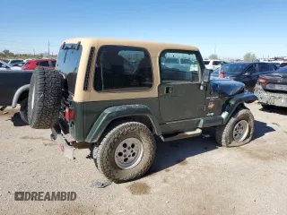 1997 Jeep Wrangler Sahara with VIN 1J4FY49S6VP521988, listed as a Copart auction lot 80753494 with 99,909 mi miles and Salvage Title. Bid and sale history available at carsss.com. Image 3.