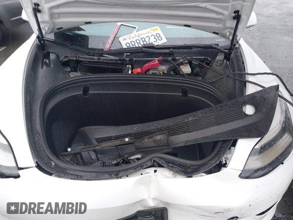 2020 Tesla Model 3 Standard Range Plus with VIN 5YJ3E1EA2LF740225, listed as a IAAI auction lot 41781554 with 46,703 mi miles. Bid and sale history available at carsss.com. Image 10.