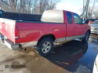 2000 Ford F-150 XL with VIN 1FTZX1724YKB03258, listed as a IAAI auction lot 41356935 with 208,570 mi miles. Bid and sale history available at carsss.com. Image 4.