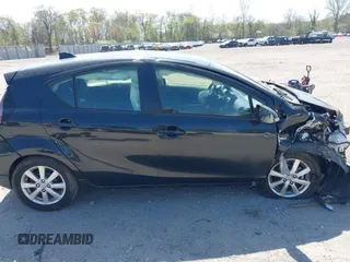 2017 Toyota Prius One z VIN JTDKDTB39H1591876, wystawiony jako IAAI lot #42086978 z przebiegiem 115 070 mil mil oraz . Historia ofert i sprzedaży dostępna na DreamBid. Obrazek 14.