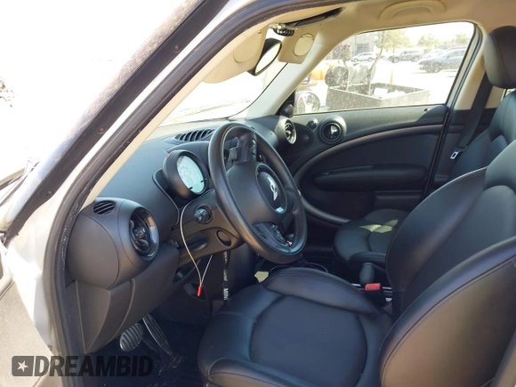 2014 MINI Countryman S with VIN WMWZC5C54EWP40882, listed as a IAAI auction lot 42633141 with 176,641 mi miles and . Bid and sale history available at DreamBid. Image 5.