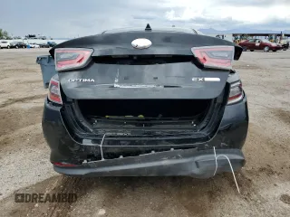 2014 Kia Optima EX with VIN KNAGN4AD0E5068864, listed as a Copart auction lot 64991005 with 125,108 mi miles and Salvage title. Bid and sale history available at DreamBid. Image 6.
