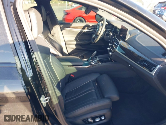 2019 BMW 5 Series M550i xDrive with VIN WBAJB9C51KB288416, listed as a IAAI auction lot 41265378 with 52,529 mi miles and . Bid and sale history available at DreamBid. Image 5.