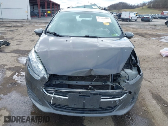 2015 Ford Fiesta SE with VIN 3FADP4EJ0FM117739, listed as a IAAI auction lot 41795558 with 111,000 mi miles. Bid and sale history available at carsss.com. Image 6.