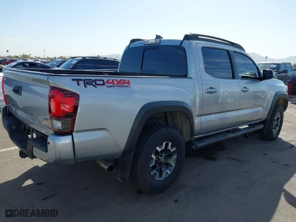 2018 Toyota Tacoma SR with VIN 3TMCZ5AN1JM141605, listed as a IAAI auction lot 41558201 with 91,855 mi miles. Bid and sale history available at carsss.com. Image 4.