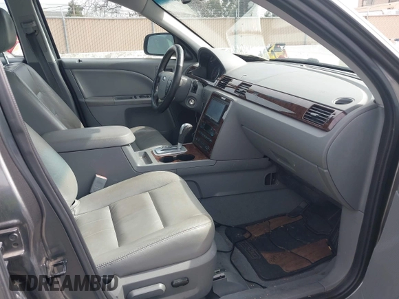 2006 Ford Five Hundred SEL with VIN 1FAFP24106G147137, listed as a IAAI auction lot 41823911 with 132,936 mi miles. Bid and sale history available at carsss.com. Image 5.