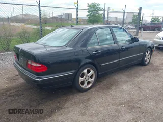 2002 Mercedes-Benz E-Class with VIN WDBJF65J52B496832, listed as a IAAI auction lot 42202331 with 156,304 mi miles. Bid and sale history available at carsss.com. Image 4.