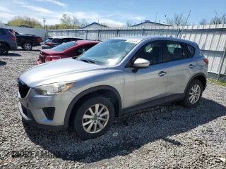 2015 Mazda CX-5 Sport z VIN JM3KE2BE3F0474927, wystawiony jako Copart lot #55444685 z przebiegiem 168 264 mil mil oraz Czysty tytuł • Clean title. Historia ofert i sprzedaży dostępna na DreamBid. Obrazek 1.