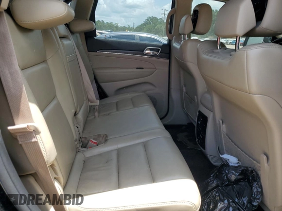 2018 Jeep Grand Cherokee Sterling z VIN 1C4RJEBG4JC241944, wystawiony jako Copart lot #61679565 z przebiegiem 83 480 mil mil oraz Szkoda całkowita • Salvage title. Historia ofert i sprzedaży dostępna na DreamBid. Obrazek 10.