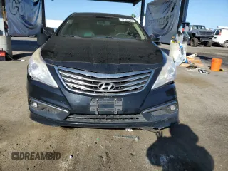 2015 Hyundai Azera z VIN KMHFG4JGXFA447569, wystawiony jako Copart lot #57344125 z przebiegiem 214 503 mil mil oraz Czysty tytuł • Clean title. Historia ofert i sprzedaży dostępna na DreamBid. Obrazek 5.
