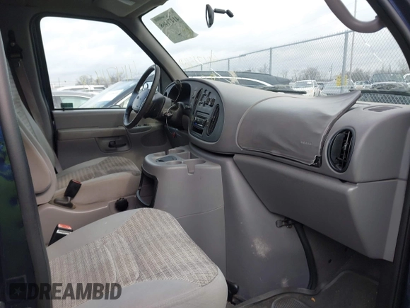 2002 Ford Econoline Passenger XL with VIN 1FMRE11L02HB30156, listed as a IAAI auction lot 41471468 with 128,320 mi miles and . Bid and sale history available at DreamBid. Image 5.