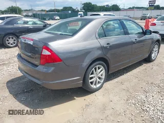 2012 Ford Fusion SEL z VIN 3FAHP0JG4CR265377, wystawiony jako IAAI lot #42221191 z przebiegiem 154 442 mil mil oraz . Historia ofert i sprzedaży dostępna na DreamBid. Obrazek 4.