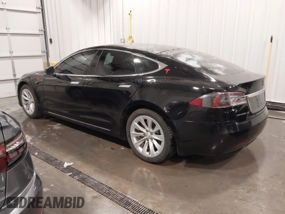 2018 Tesla Model S 75D with VIN 5YJSA1E2XJF248751, listed as a IAAI auction lot 42079081 with 75,904 mi miles and . Bid and sale history available at DreamBid. Image 3.