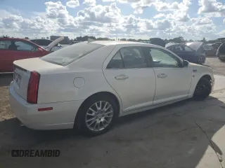 2010 Cadillac STS AWD z VIN 1G6DU6EV9A0138248, wystawiony jako Copart lot #85649154 z przebiegiem 137 227 mil mil oraz Nie do naprawy • Non repairable. Historia ofert i sprzedaży dostępna na DreamBid. Obrazek 3.