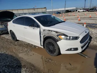 2013 Ford Fusion SE with VIN 3FA6P0HRXDR320317, listed as a Copart auction lot 51501105 with 141,311 mi miles and Salvage Title. Bid and sale history available at DreamBid. Image 4.