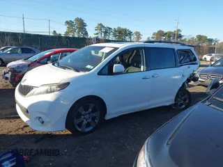 2014 Toyota Sienna SE with VIN 5TDXK3DC1ES503751, listed as a IAAI auction lot 41709975 with 229,771 mi miles and . Bid and sale history available at DreamBid. Image 14.