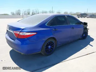 2015 Toyota Camry XLE with VIN 4T4BF1FK3FR480950, listed as a IAAI auction lot 41803603 with 256,440 mi miles. Bid and sale history available at carsss.com. Image 4.