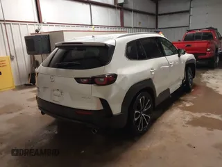 2023 Mazda CX-50 S Premium Plus with VIN 7MMVABEMXPN139186, listed as a IAAI auction lot 41289690 with 26,556 mi miles and . Bid and sale history available at DreamBid. Image 4.