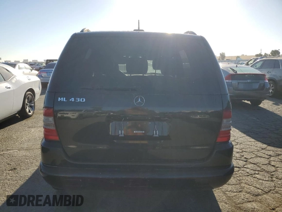 2001 Mercedes-Benz M 320/430/500 z VIN 4JGAB72E81A223281, wystawiony jako Copart lot #71578344 z przebiegiem 112 186 mil mil oraz Czysty tytuł • Clean title. Historia ofert i sprzedaży dostępna na DreamBid. Obrazek 6.