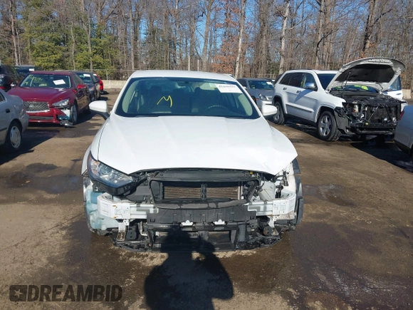 2018 Ford Fusion S with VIN 3FA6P0G77JR229730, listed as a IAAI auction lot 41426559 with 124,568 mi miles. Bid and sale history available at carsss.com. Image 12.